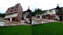 '비 좀 내렸다고...' 집이 무너지는 것을 바라보는 남성