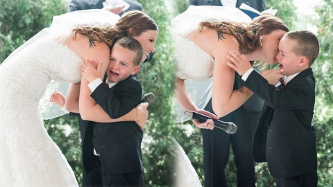 결혼식에서 신부에게 매달려 서럽게 우는 아이의 정체