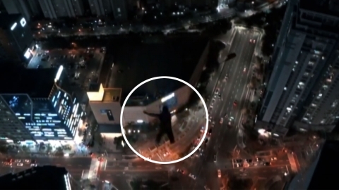 해운대 고층 건물에서 '점프'...낙하산 활강 외국인 체포