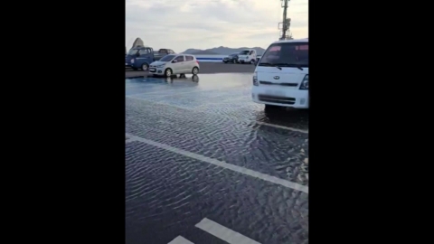 Even strong winds in the contrast...Flooding all over the waterfront roads