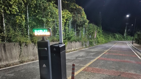 'Looking down at the parking fees'...A woman in her 50s died after getting stuck in a parking breaker. 