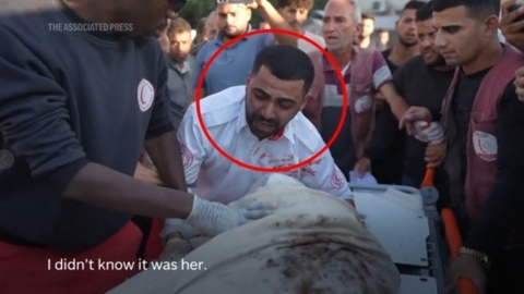 "The body in the white cloth was the mother" ...Palestinian paramedics 'crying' 