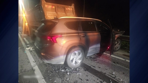 An SUV crashes into a truck that was checking for failure, killing the tow driver.