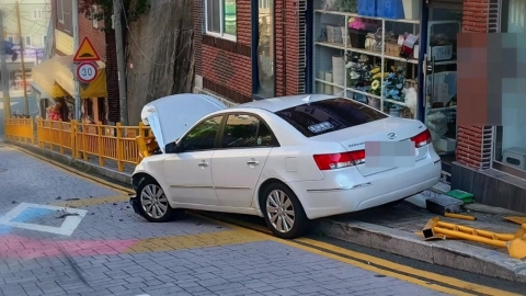 Car dashes on the sidewalk near the elementary school...No casualties.