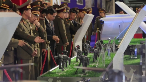 Kim Jong-un with self-destructive drones and rifles... additional support for Russia?