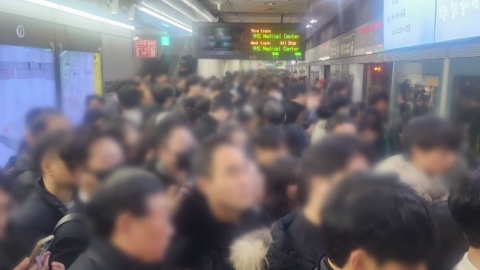 You told me to use public transportation...A 'hell train' subway pile delay.