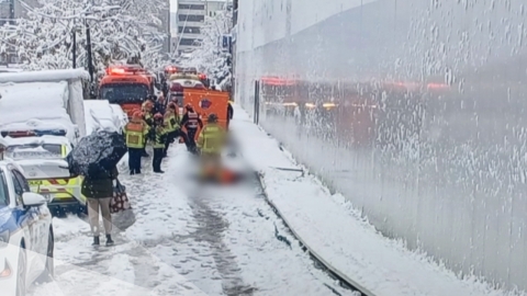 Construction site pedestrian walkway cover collapsed due to heavy snow...3 Injured