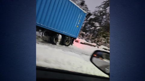 Trailer stopped on the highway...heavy congestion