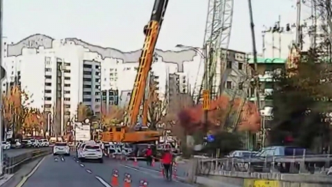 Crash during demolition of golf course structure...A worker in his 50s dies.