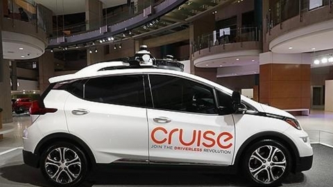 U.S. GM withdraws from robo-taxi business as Tesla joins in