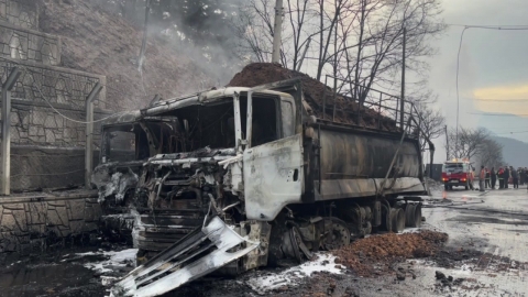 The truck crashed into the parked tank lorry. Fire...One person will die.