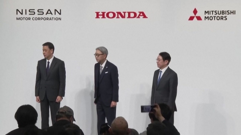 Official announcement of merger between Honda and Nissan in Japan..."A goal for 2026".