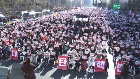 A rally to "call for impeachment" throughout the city...There's also a rally to fight back.