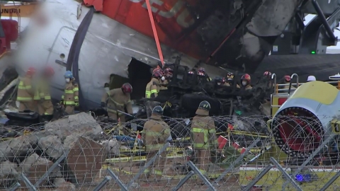 The first search for the tail of the plane...Examine the engine buried in the dirt.