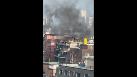 A four-story house in Jangchung-dong, Seoul...Rescuing two people