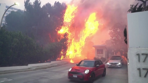 L.A. Wildfire Spreads Downtown for 5th Day...an escalation of tension