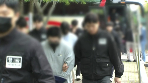 송환 캄보디아 조직원들 무더기 구속 송치…"스스로 가담"