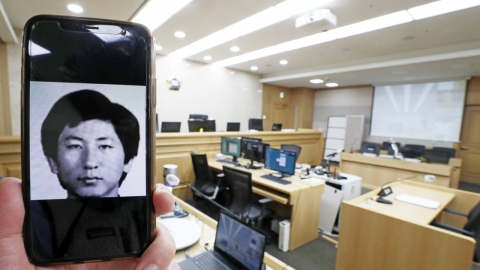 '이춘재 연쇄살인' 누명 고 윤동일 씨 재심 '무죄' 선고