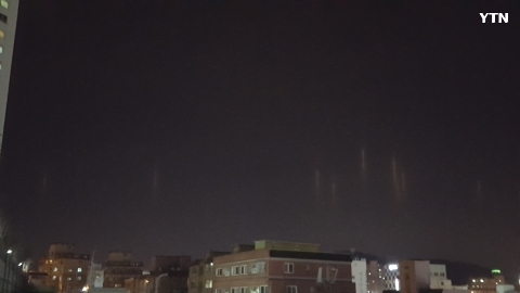 부산 하늘에 괴불빛 